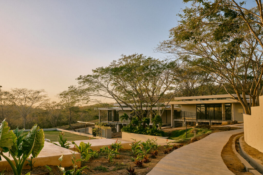Tambran School campus surrounded by tropical hills in El Encanto del Sur, San Juan del Sur.